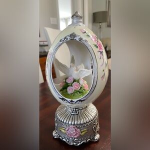 Vintage mid 1900’s Porcelain Egg music box , birds on Roses silver Base.